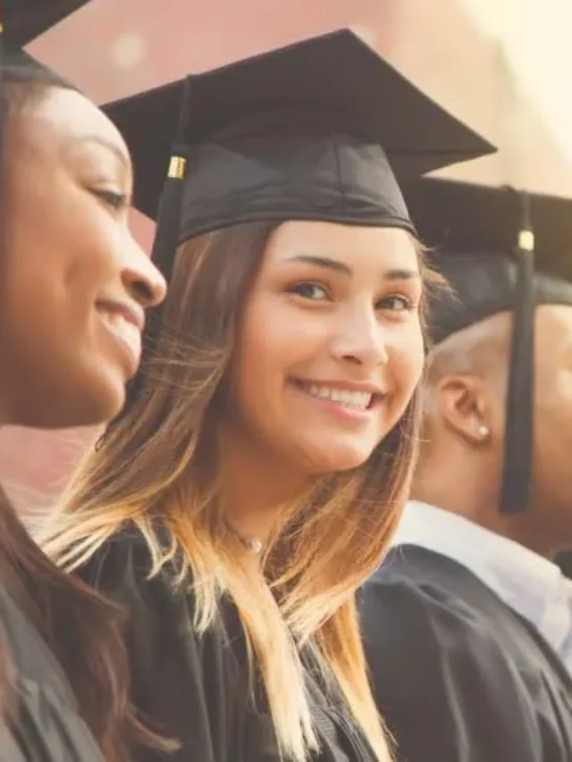 Graduation_StudentsGroup_Smiling_Outdoor_GettyImages-907837926